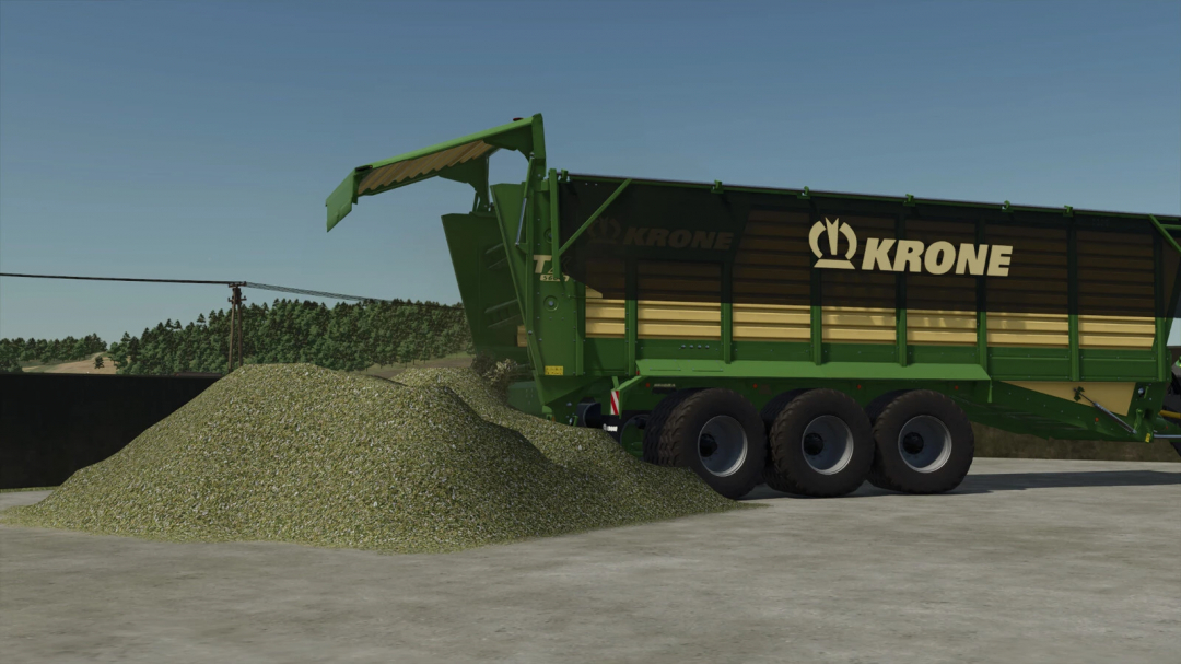 FS25 mod Krone TX 560 D tipping silage onto ground in Farming Simulator 25.