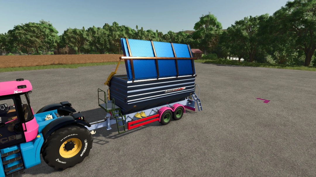 FS25 mod LWS v1.0.0.0 featuring a colorful tractor with a blue trailer in a farm setting.