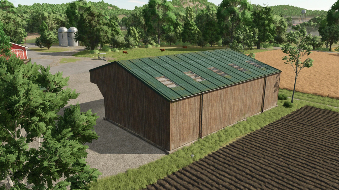 Large wooden shed in a farm setting from FS25 mods, surrounded by fields and trees.