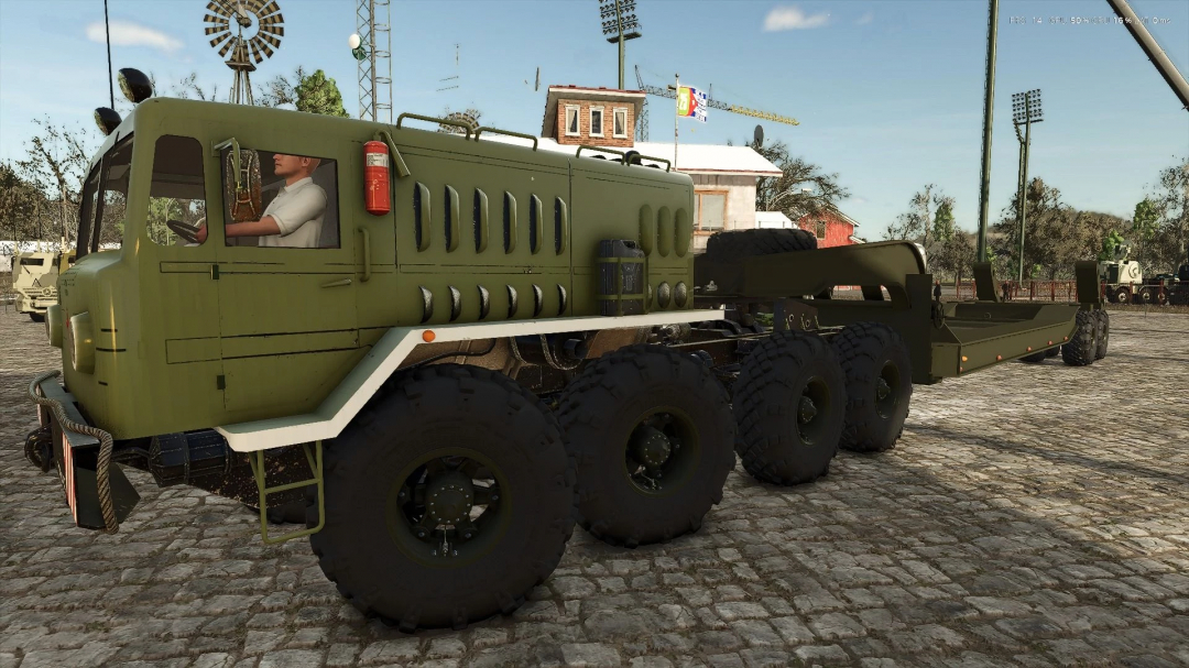 MAZ 7310 Pack mod in Farming Simulator 25, featuring an olive green heavy-duty truck on cobblestone.