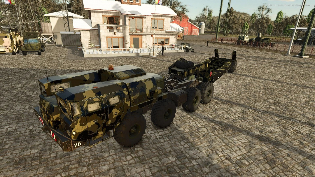 Camouflaged military vehicle from MAZ MF Pack mod in FS25 parked on cobblestone road.