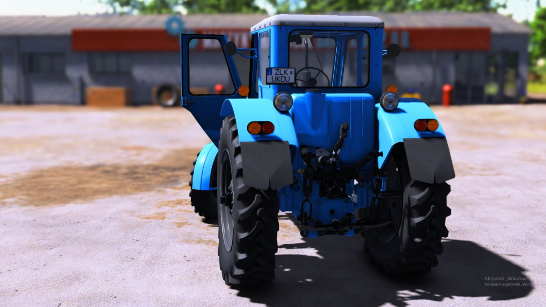 Rear view of MTZ 50 tractor mod in FS25, showcasing detailed design in a farm setting.