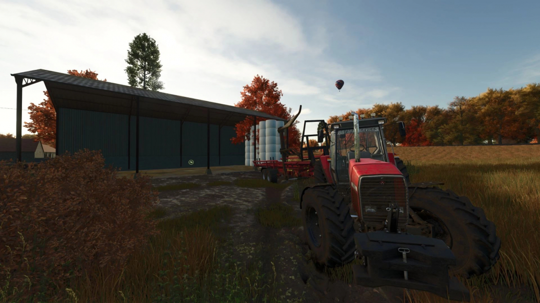 Massey Ferguson 3670 tractor mod in FS25 beside a barn with autumn foliage, showcasing Farming Simulator 25 mods.