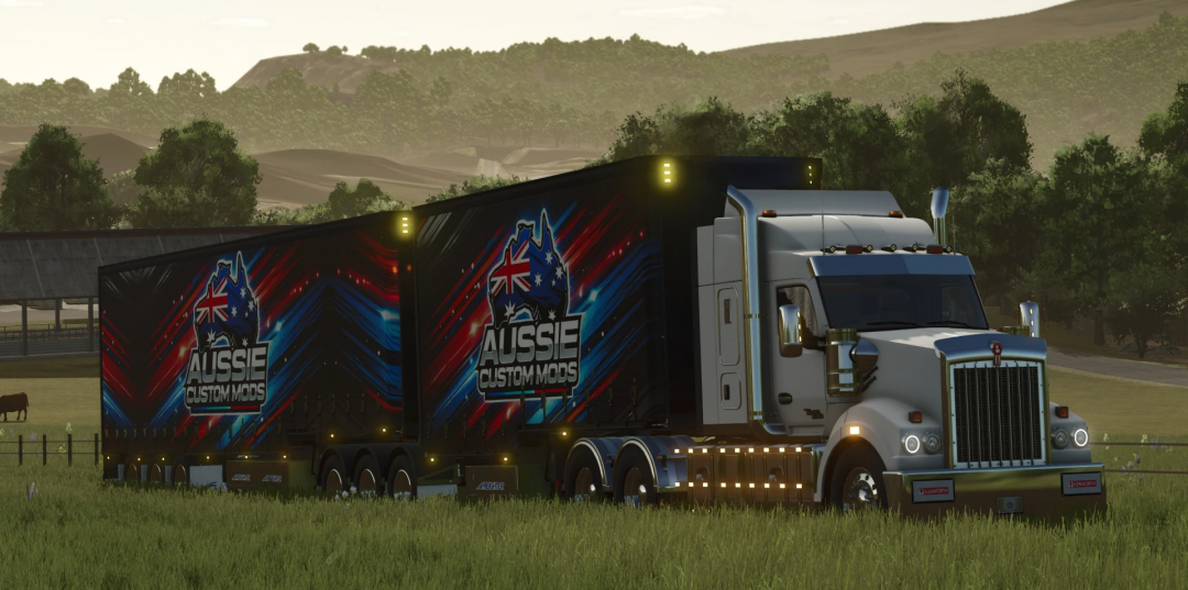 FS25 mod showing MaxiTrans Freighter Taughtliners truck featuring Aussie Custom Mods design in a rural landscape.