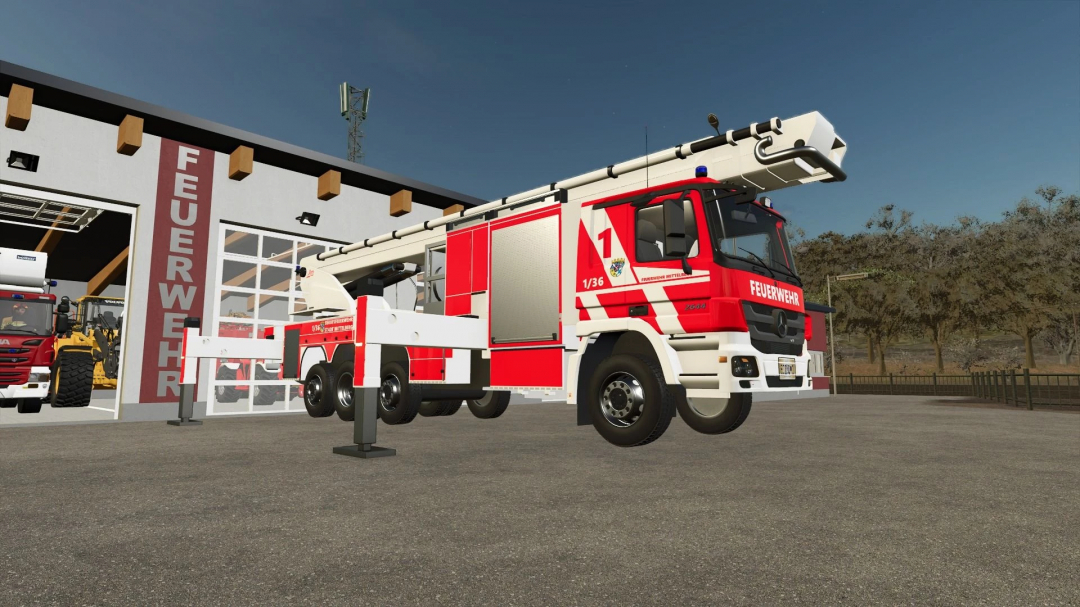 FS25 mod Mercedes Benz BF Mittelberg fire truck parked outside a fire station.