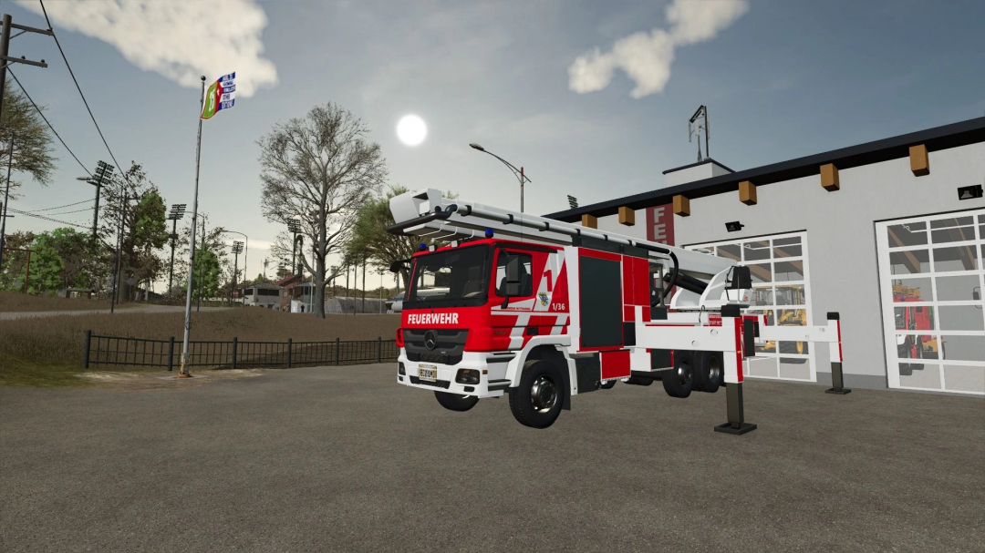 Mercedes Benz BF Mittelberg fire truck in FS25 mod, parked outside a fire station.