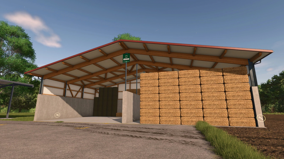 FS25 Object Storages mod showing a barn with stacked hay bales, enhancing Farming Simulator 25 gameplay.