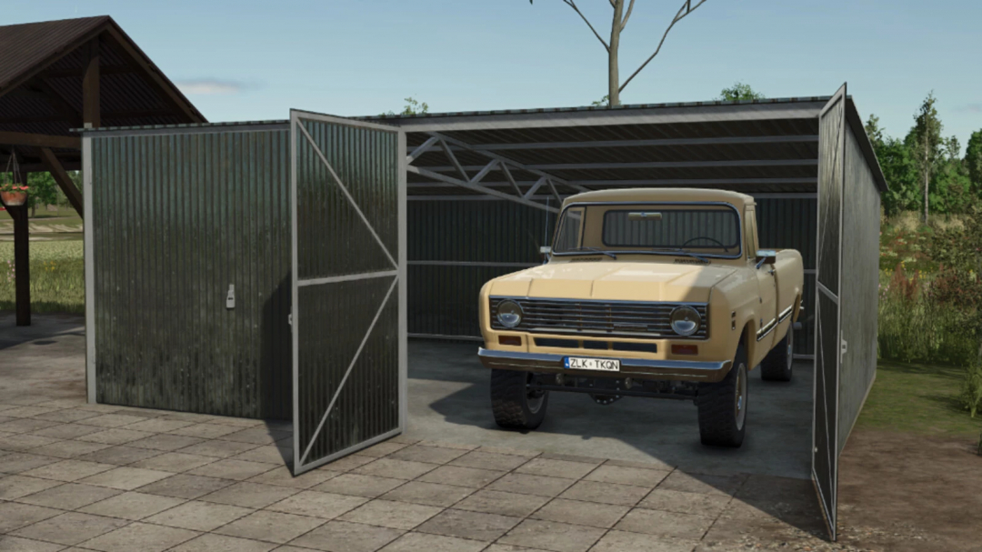 Old Farm Building Set mod in FS25 with truck in open barn.