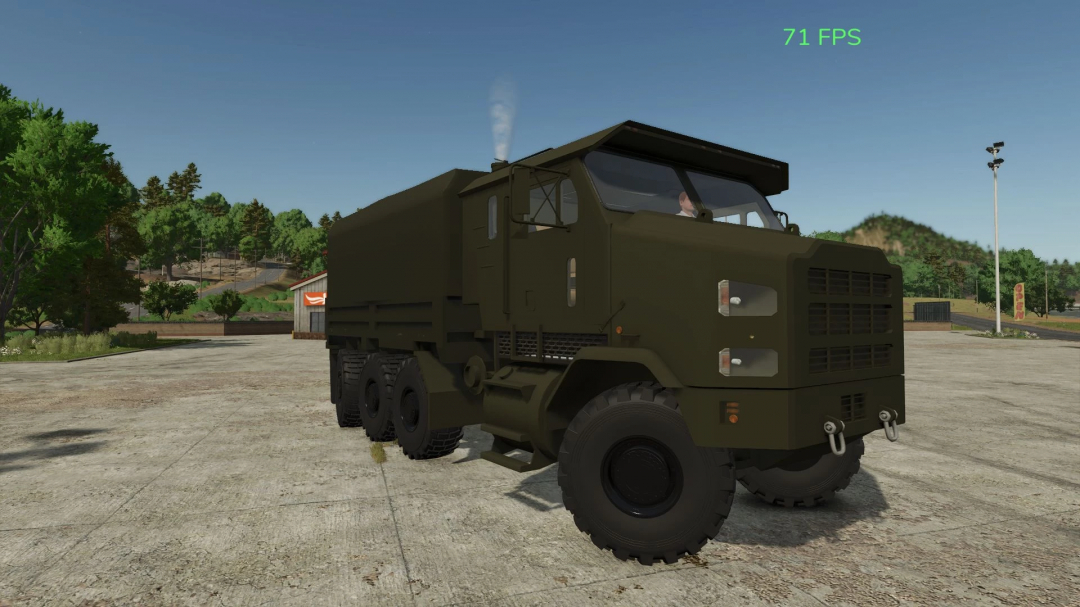 FS25 mod Oshkosh v1.0.0.0 truck with a military design on a concrete lot.