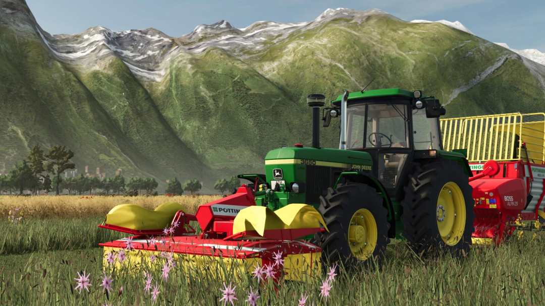 FS25 mods Pöttinger CAT Pack with green tractor in meadow under mountains.