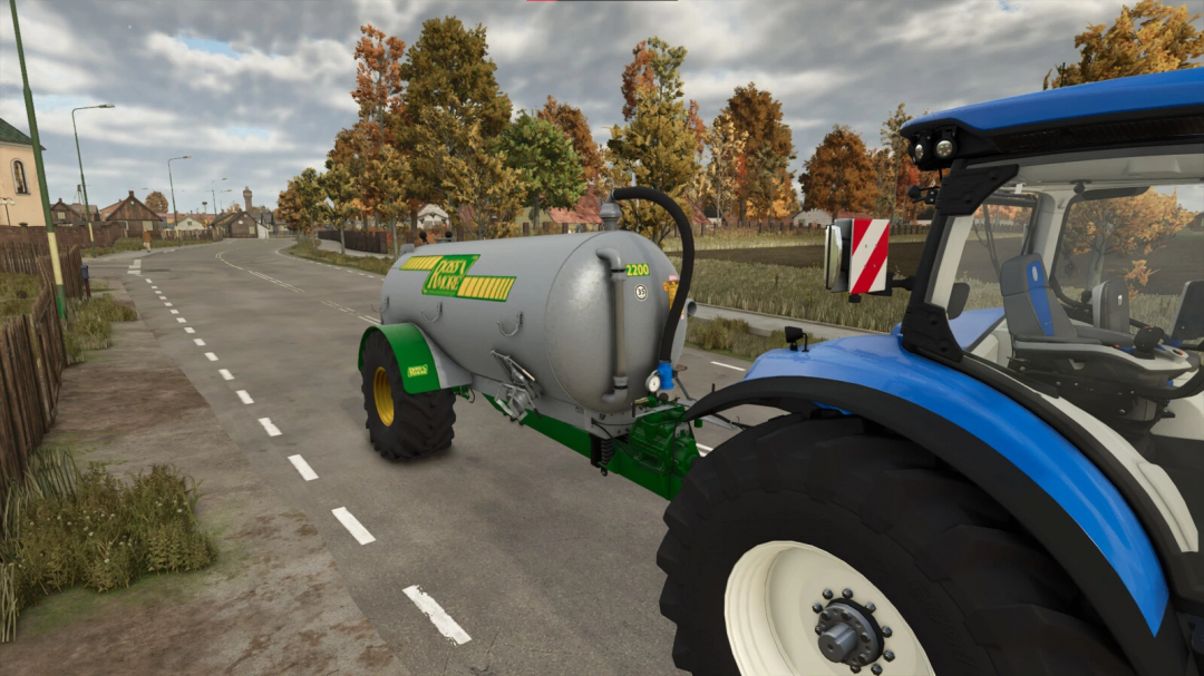 FS25 mod Ross More 2200G Slurry Tanker on a rural road in Farming Simulator 25.