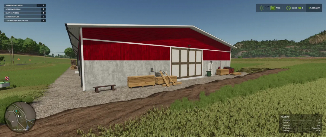 FS25 mod Sawmill PelletPalet v1.0.0.0 showing a red barn with wood pallets outside, set in a lush farming landscape.