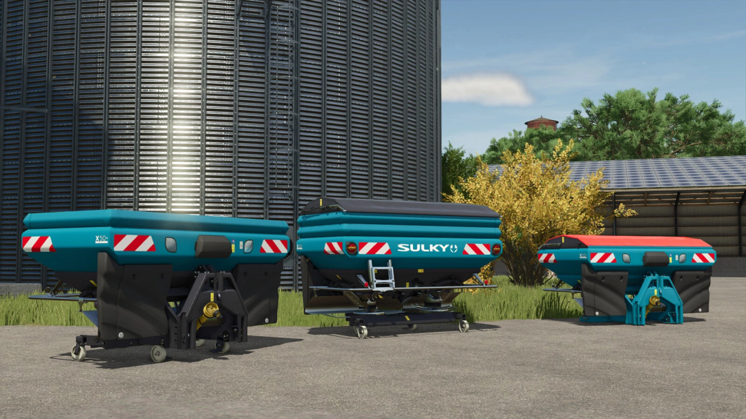 Sulky X50 Econov FS25 mod features three blue and red fertilizer spreaders in front of a storage silo.