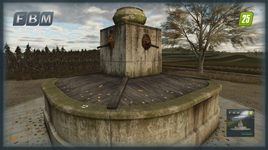 FS25 mod Town Fountain v1.0.0.0 featuring a weathered stone fountain in a rural field setting.