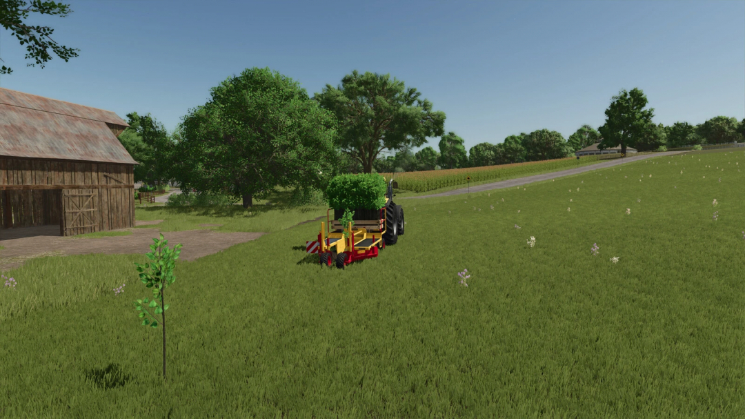 Tractor planting tree saplings near barn in FS25 with Tree Sapling Pack mod.