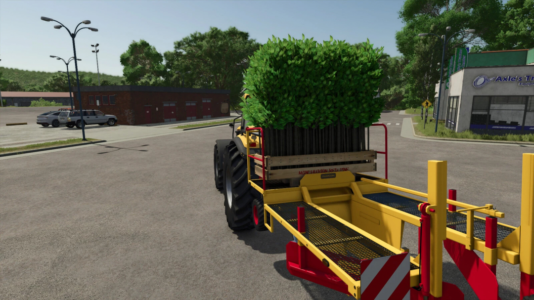 FS25 Tree Sapling Pack mod showcasing a tractor carrying saplings on a street in Farming Simulator 25.