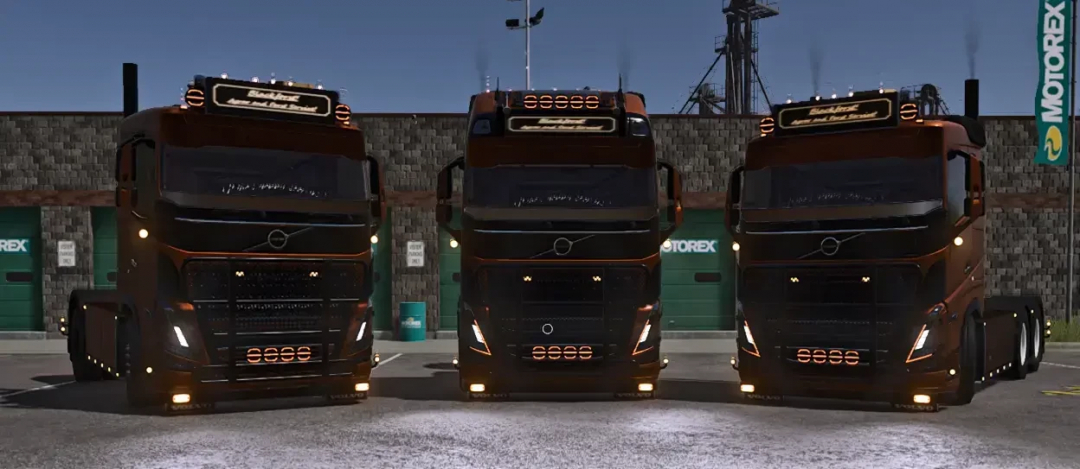 Volvo FH16 trucks in FS25 mod showcase, parked side by side at a garage.