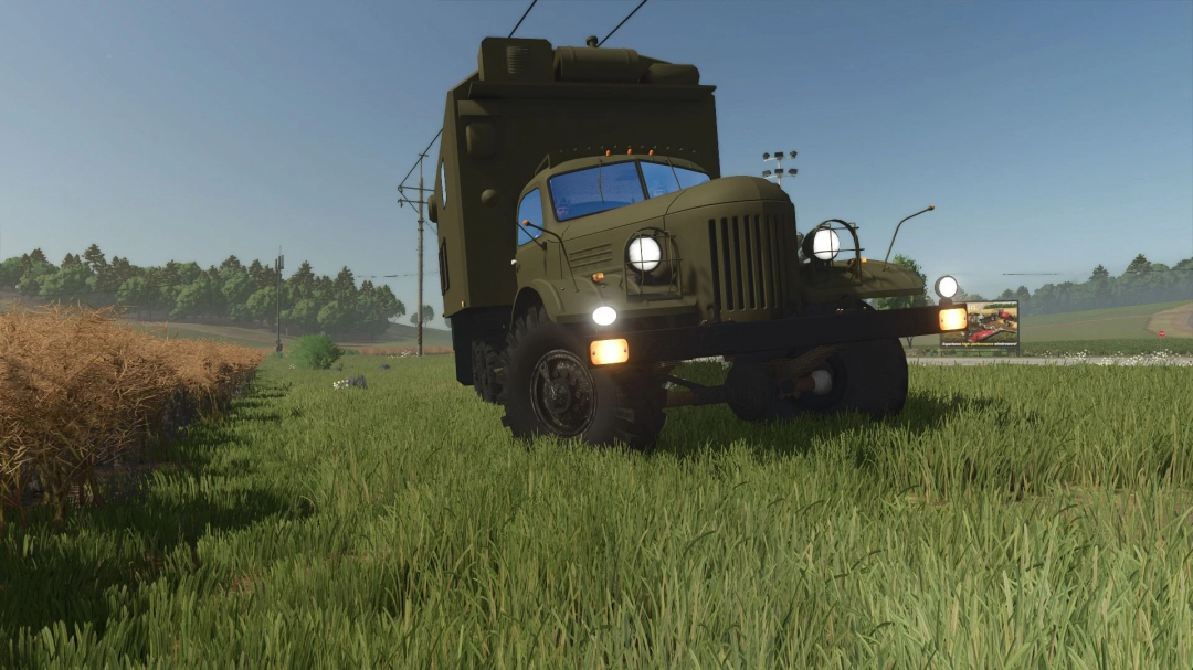 Zil 157 Aparatownia P12 mod for FS25, showing a military-style truck in a grassy field.