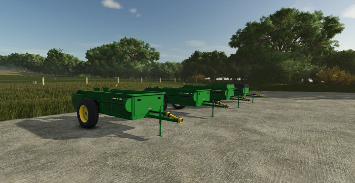 fs25-mods,  John Deere 34 Manure Spreader mod in FS25 displayed on a concrete surface with trees in the background.