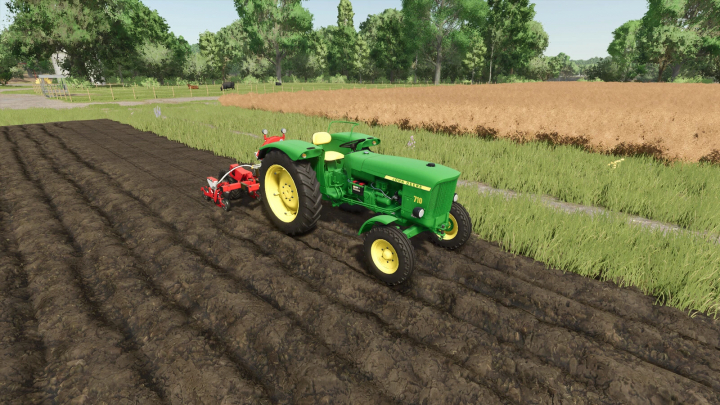 fs25-mods,  John Deere 710 tractor mod for FS25 plowing a field, surrounded by lush greenery in Farming Simulator 25.