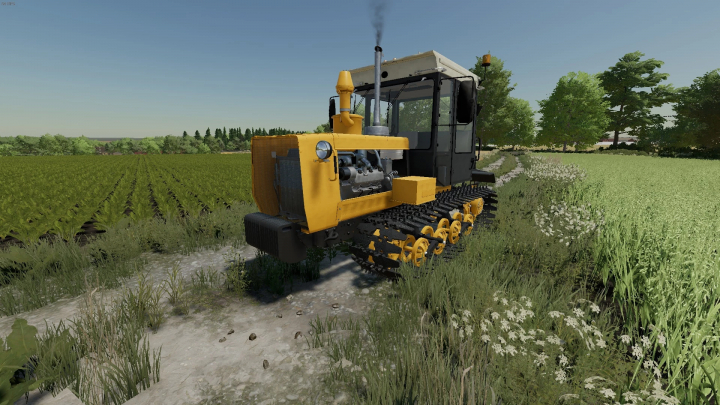 fs22-mods, KhTZ TC-5 tractor mod in Farming Simulator 22 fields. FS22 mods enhance gameplay with realistic machinery.