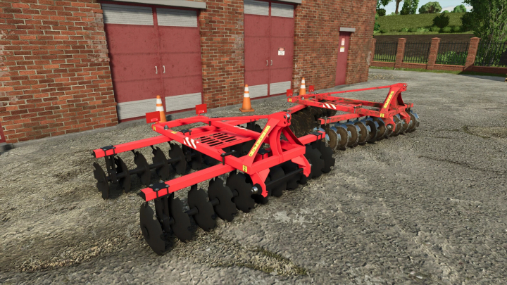 fs25-mods,  Lizard Disc Harrow 2.4 mod for Farming Simulator 25 in front of brick building.