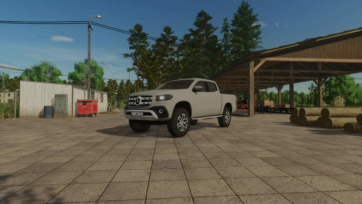 fs25-mods,  Mercedes Benz X-Class mod in FS25, parked on a farm with equipment and logs in the background.