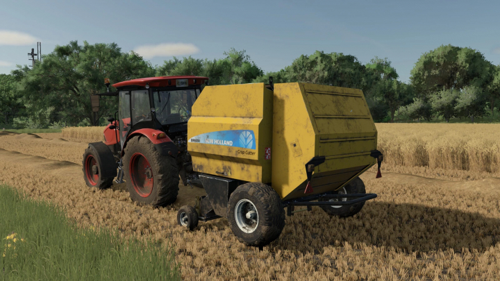 fs25-mods,  New Holland BR 6090 mod in FS25, attached to a tractor on a harvested field.