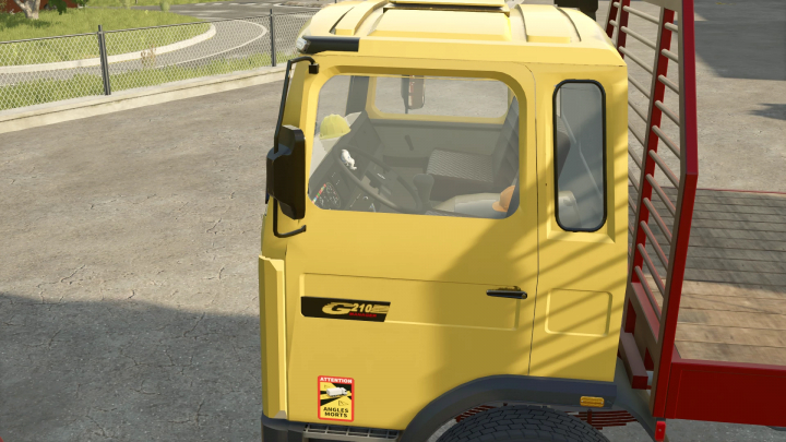 fs25-mods,  Renault G210 mod for FS25, showing the cab with yellow and red detailing.