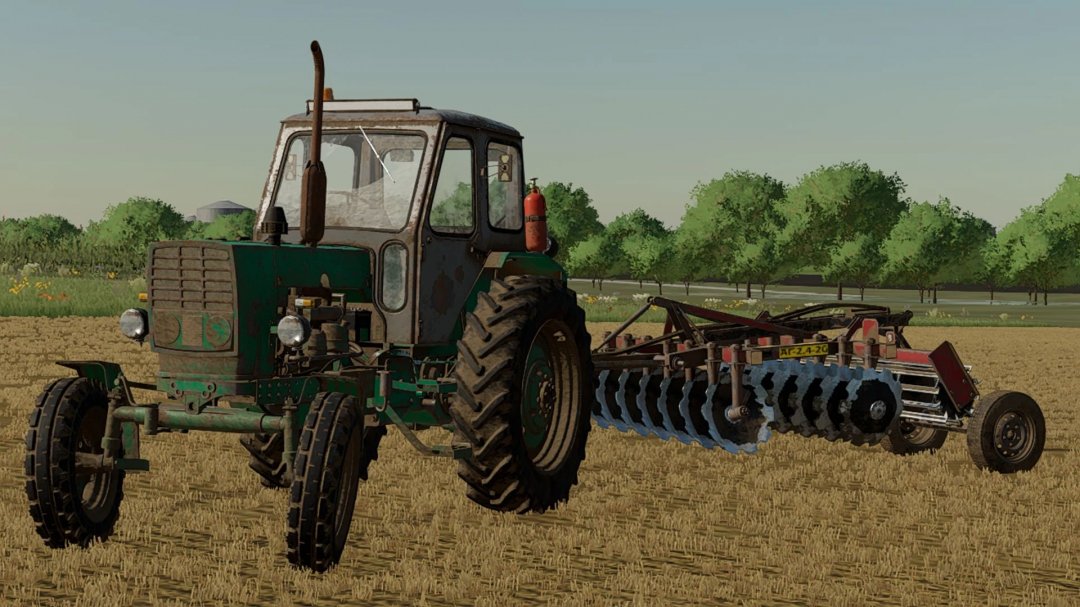 FS22 mod AG-2.4-20 trailer attached to a tractor on a field in Farming Simulator 22.