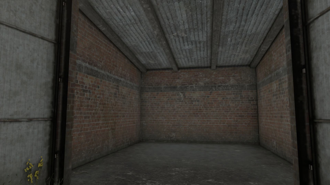 Interior of a brick building mod in FS25, showcasing concrete floor and corrugated ceiling.