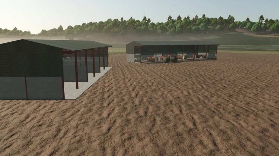 British cattle sheds mod in Farming Simulator 25 featuring spacious enclosures on a farm field.