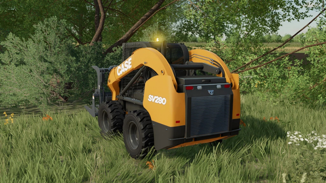 CASE Skid Steer from FS22 mod pack in a grassy field.