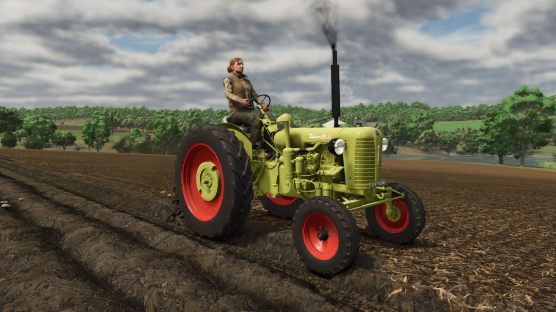 Classic tractor mod in FS25 with player driving on a field, featuring vintage design and smoke exhaust.