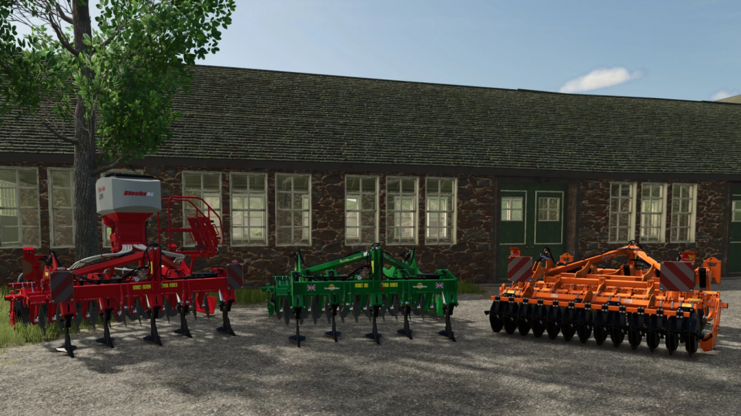 FS25 DTX 300AR Pack v1.0.0.0 showing red, green, and orange farm equipment outside a building.