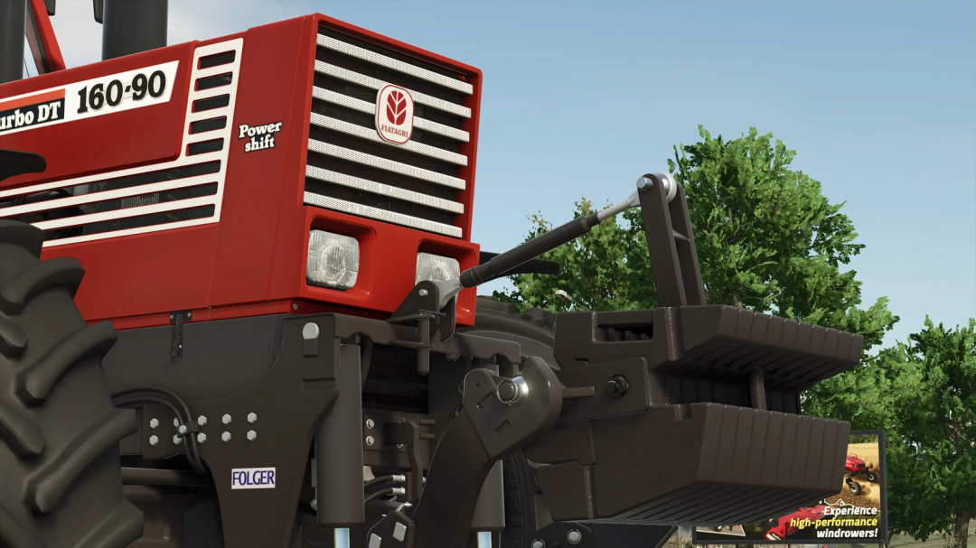 Close-up of Fiat tractor with weight attachment in FS25 mod.