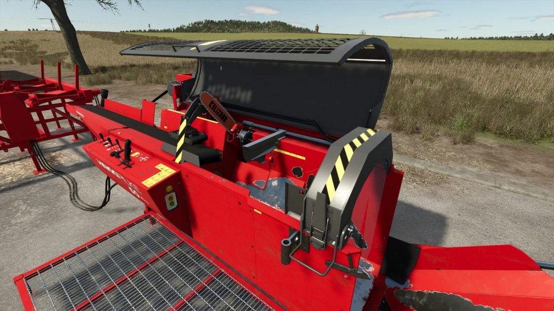 Close-up of firewood production machine from FS25 mod, showing controls and safety guards.