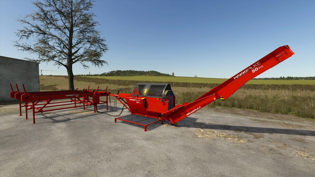 FS25 mod Firewood Production v1.0.0.0 featuring a red wood processing machine in a rural setting.