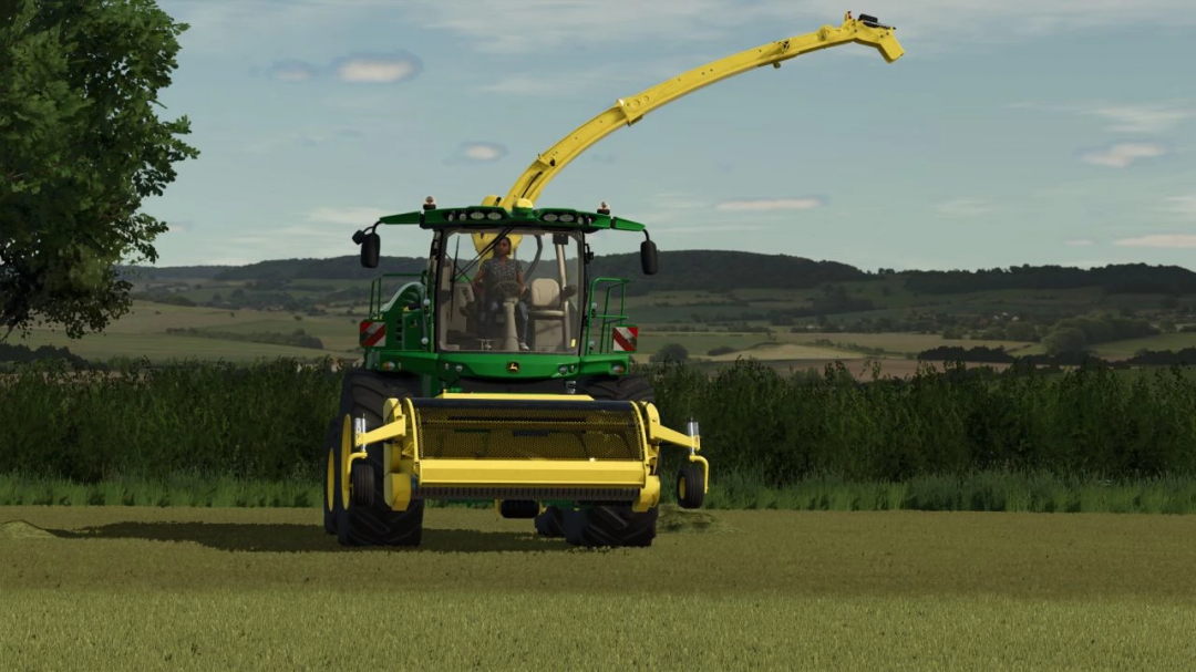 FS25 mods: Foxdale Farm v1.0.0.0, a farm vehicle with a green and yellow design operates in a field under a blue sky.