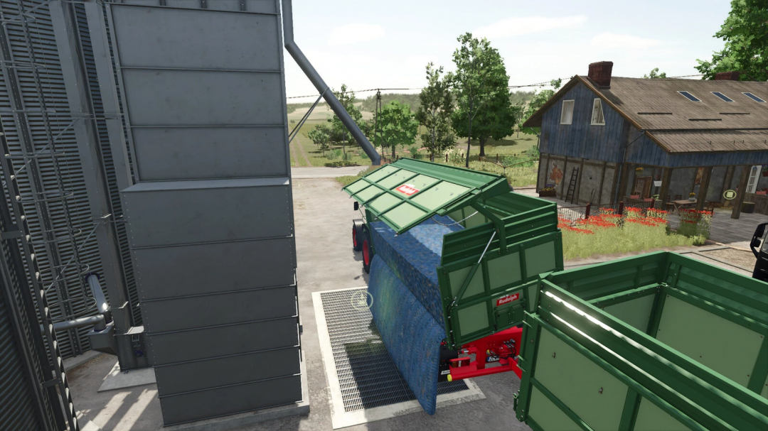 FS25 mods: Green fruit greenhouse setup near a farmhouse and machinery in Farming Simulator 25.