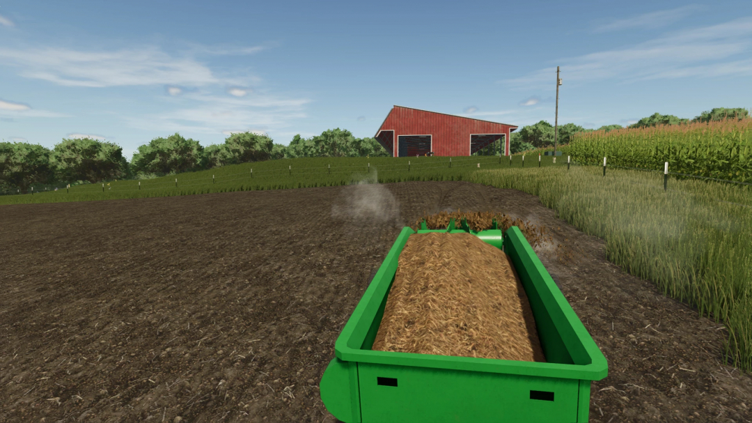 John Deere 34 Manure Spreader FS25 mod spreading manure in a field, with a red barn in the background.