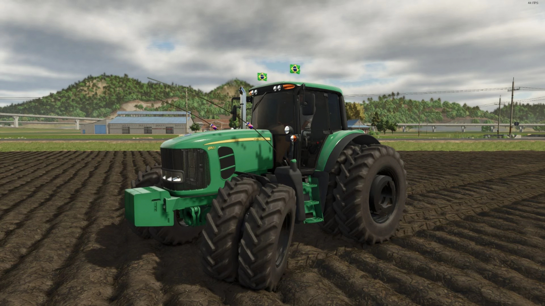 John Deere 6J OLD tractor mod in Farming Simulator 25 on a plowed field.