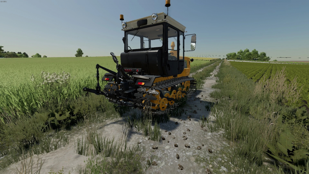 FS22 KhTZ TC-5 mod showcasing a tracked tractor in a field for Farming Simulator 22.