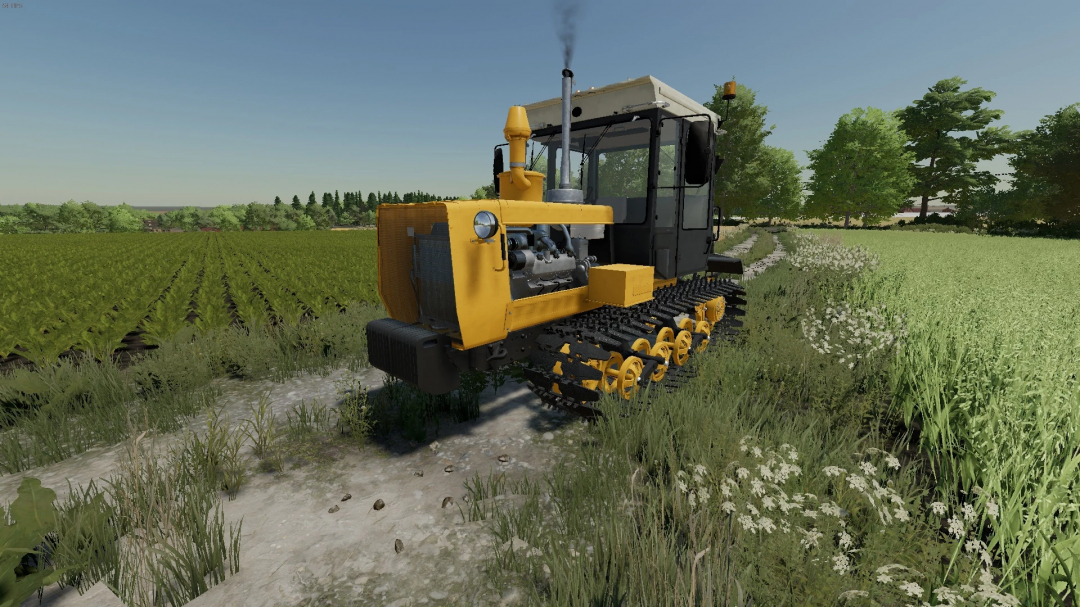 KhTZ TC-5 tractor mod in Farming Simulator 22 fields. FS22 mods enhance gameplay with realistic machinery.