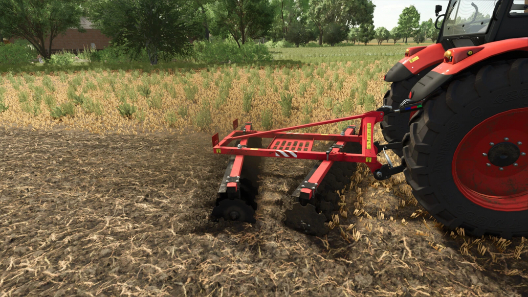 Lizard Disc Harrow 2.4 mod in action attached to tractor in FS25, showing soil being tilled in a field.