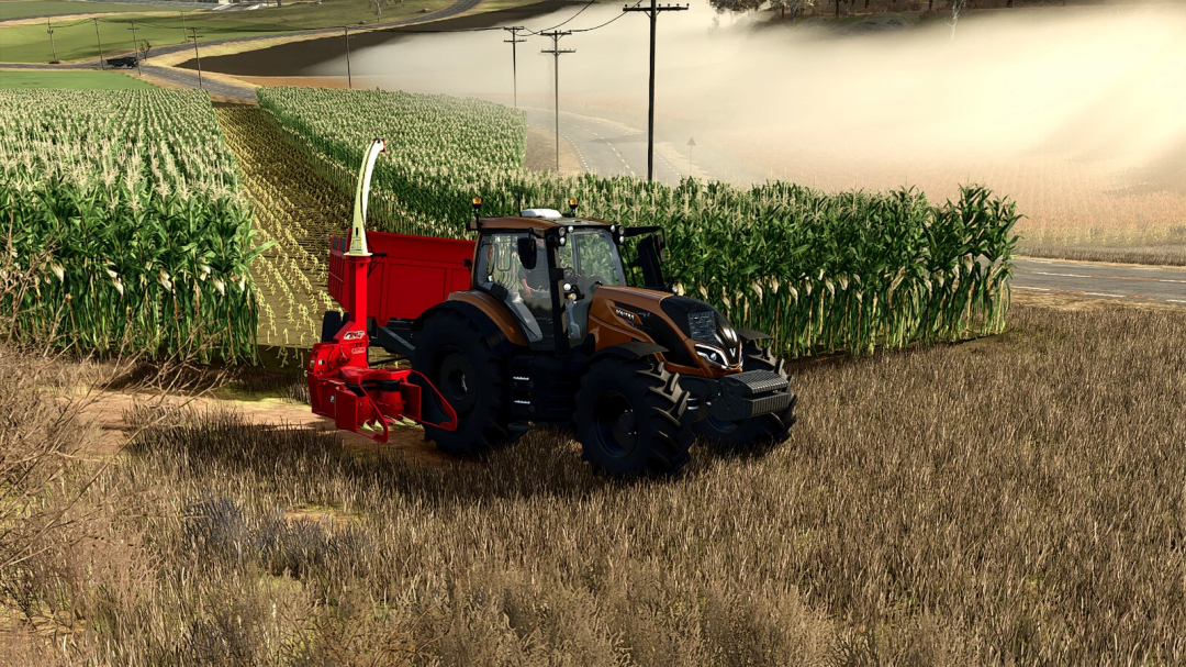 FS25 mod image showing Lizard FTN 1000 v1.0.0.0 attached to a tractor harvesting a cornfield.