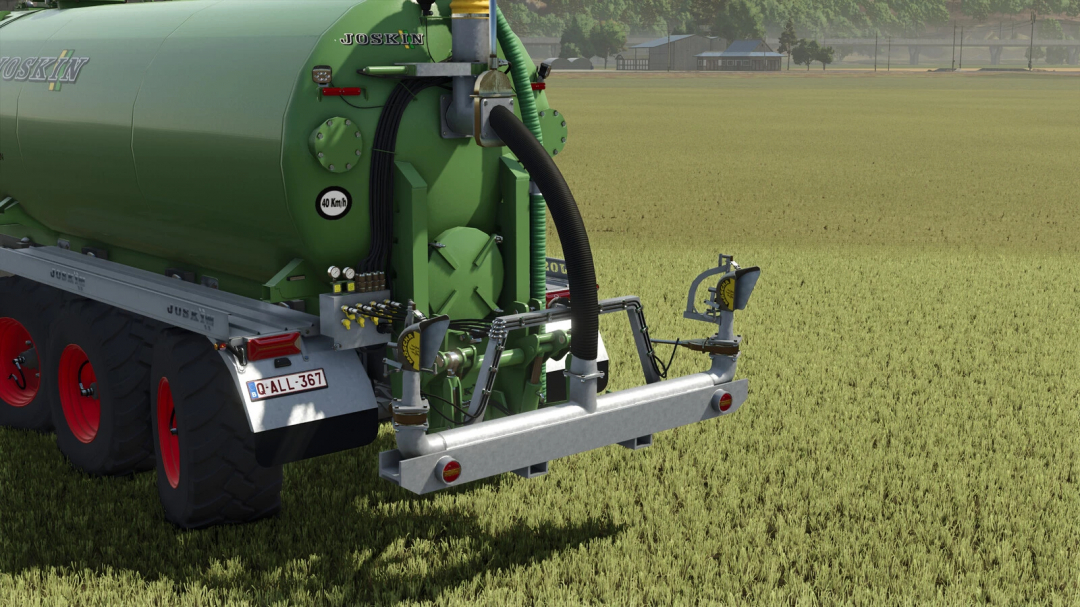 FS25 mod Lizard Moscha Duo v1.0.0.0 features a green slurry tank with hoses and attachments on a field.