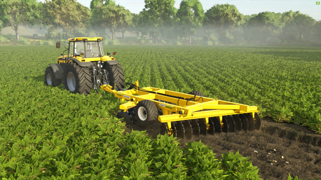 FS25 mod Lizard SAC Pack v1.0.0.0 featuring a yellow tractor with a disc harrow working in a green field.