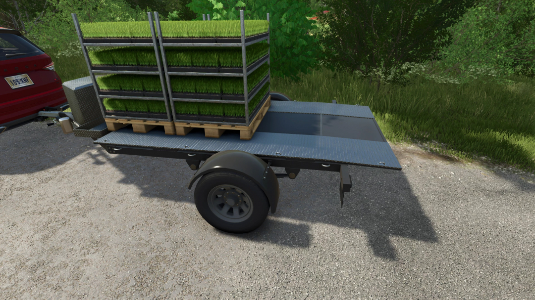 FS25 mod image: Marlon MC3 v1.0.0.0 trailer with green crop trays loaded on a metallic platform.