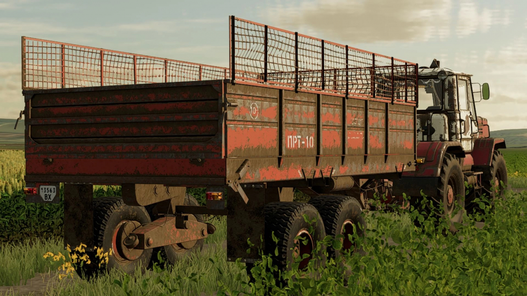 FS22 mod PRT-10 trailer v1.1.0.0 in a field, showcasing detailed farming equipment in Farming Simulator 22.